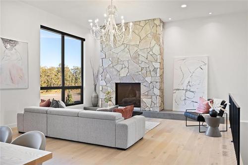 16 Ash Cove, Winnipeg, MB - Indoor Photo Showing Living Room With Fireplace