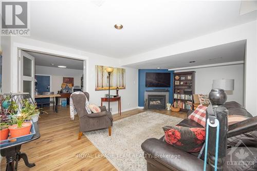 4352 Wildmint Square, Ottawa, ON - Indoor Photo Showing Living Room With Fireplace