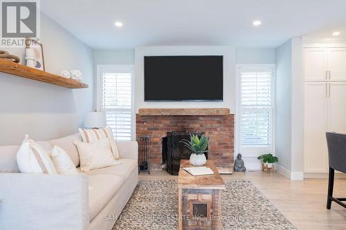 100 Rutledge Road, Mississauga, ON - Indoor Photo Showing Living Room With Fireplace