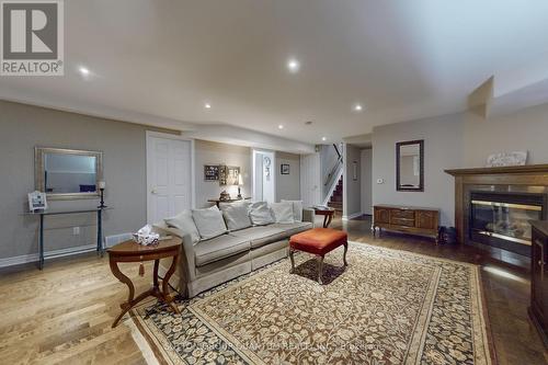 43 Oarsman Crescent, St. Catharines, ON - Indoor Photo Showing Living Room With Fireplace