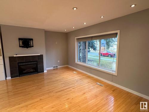 11231 75 Av Nw, Edmonton, AB - Indoor With Fireplace