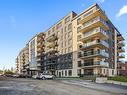 ExtÃ©rieur - 505-4420 Boul. St-Jean, Dollard-Des-Ormeaux, QC  - Outdoor With Balcony With Facade 