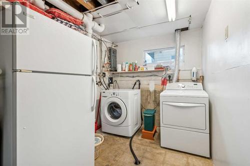 3411 Boulton Road Nw, Calgary, AB - Indoor Photo Showing Laundry Room