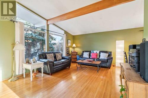 3411 Boulton Road Nw, Calgary, AB - Indoor Photo Showing Living Room With Fireplace