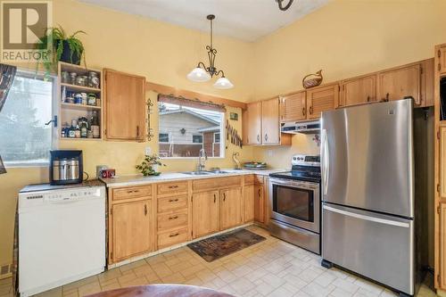 3411 Boulton Road Nw, Calgary, AB - Indoor Photo Showing Kitchen With Double Sink