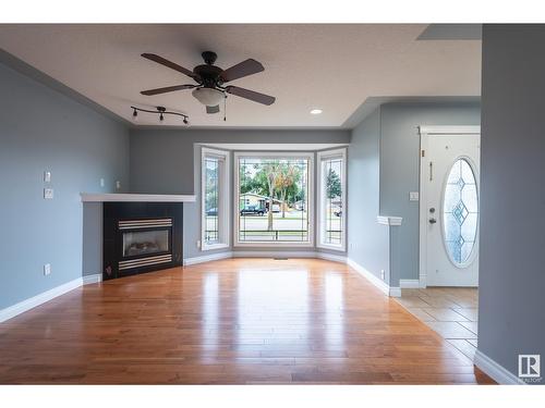 13428 118 Av Nw, Edmonton, AB - Indoor Photo Showing Living Room With Fireplace