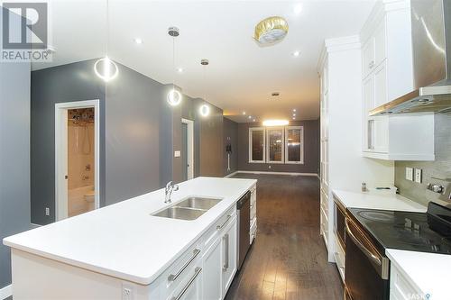 4777 James Hill Road, Regina, SK - Indoor Photo Showing Kitchen With Double Sink With Upgraded Kitchen