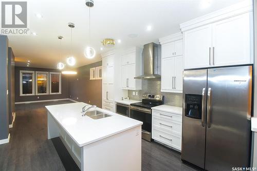 4777 James Hill Road, Regina, SK - Indoor Photo Showing Kitchen With Double Sink With Upgraded Kitchen