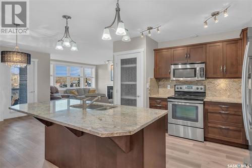 2B 5 2Nd Avenue, Lumsden, SK - Indoor Photo Showing Kitchen With Double Sink