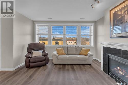 2B 5 2Nd Avenue, Lumsden, SK - Indoor Photo Showing Living Room With Fireplace