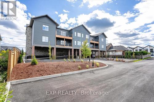 201 - 163 Port Robinson Road, Welland, ON - Outdoor With Balcony With Facade