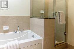 Bathroom featuring plus walk in shower - 