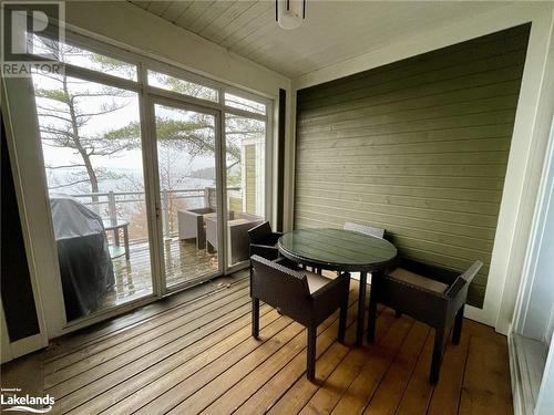 View of sunroom / solarium - 1869 Muskoka Road 118 W Unit# L204-D2, Muskoka Lakes, ON - 