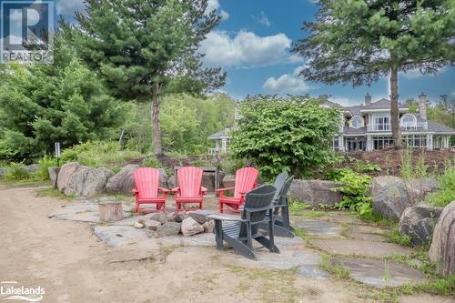 Beach fire pit - 1869 Muskoka Road 118 W Unit# L204-D2, Muskoka Lakes, ON - Outdoor