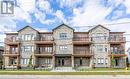 102 - 163 Port Robinson Road, Pelham, ON  - Outdoor With Balcony With Facade 