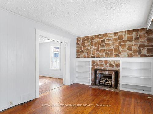 5 Albion St W, Belleville, ON - Indoor Photo Showing Living Room With Fireplace