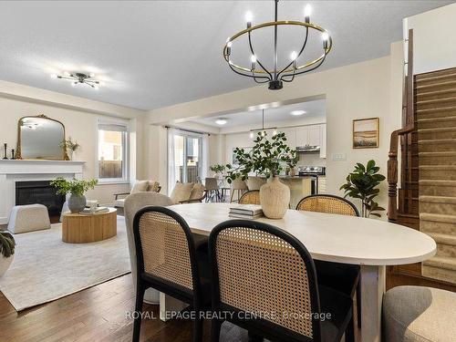 263 Grovehill Cres, Kitchener, ON - Indoor Photo Showing Dining Room With Fireplace