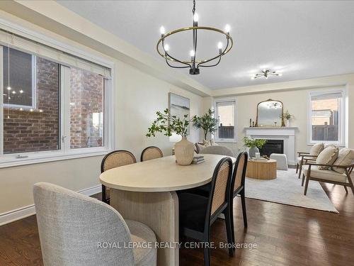 263 Grovehill Cres, Kitchener, ON - Indoor Photo Showing Dining Room With Fireplace