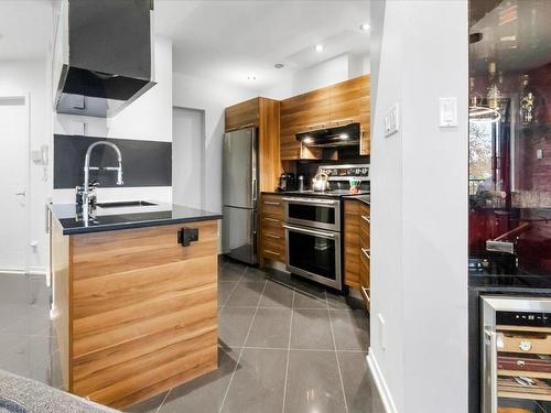 Cuisine - 11-454 Rue Élaine, Laval (Fabreville), QC - Indoor Photo Showing Kitchen With Double Sink