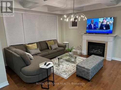 Upper - 53 Raven Cross Avenue S, Markham, ON - Indoor Photo Showing Living Room With Fireplace