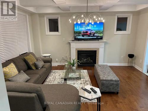 Upper - 53 Raven Cross Avenue S, Markham, ON - Indoor Photo Showing Living Room With Fireplace