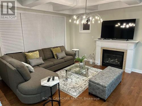 Upper - 53 Raven Cross Avenue S, Markham, ON - Indoor Photo Showing Living Room With Fireplace