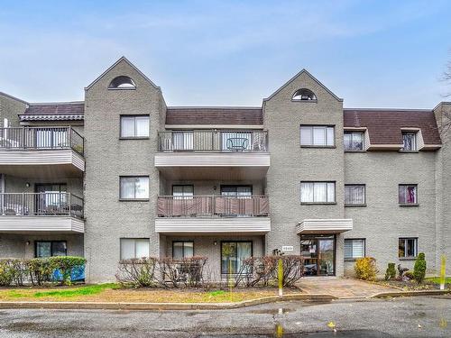 Frontage - 205-5240 Rue Riviera, Montréal (Pierrefonds-Roxboro), QC - Outdoor With Balcony With Facade