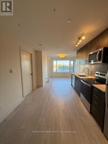 211 - 8010 Derry Road, Milton, ON - Indoor Photo Showing Kitchen