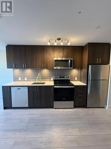 211 - 8010 Derry Road, Milton, ON - Indoor Photo Showing Kitchen