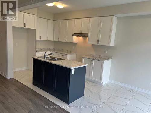 19 Tamworth Terrace, Barrie, ON - Indoor Photo Showing Kitchen With Double Sink