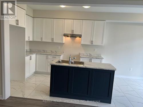 19 Tamworth Terrace, Barrie, ON - Indoor Photo Showing Kitchen With Double Sink