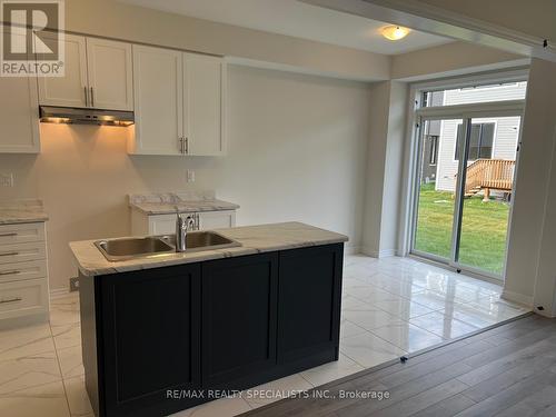 19 Tamworth Terrace, Barrie, ON - Indoor Photo Showing Kitchen With Double Sink