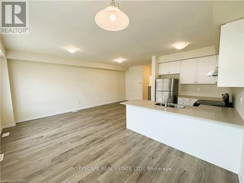 35 - 7789 Kalar Road, Niagara Falls, ON - Indoor Photo Showing Kitchen With Double Sink