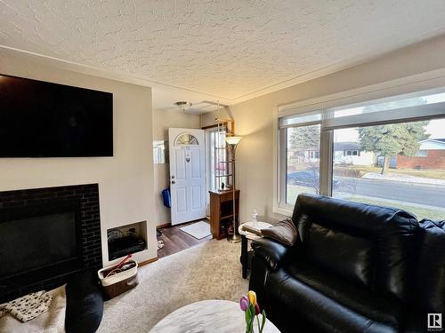 13232 63 St Nw, Edmonton, AB - Indoor Photo Showing Living Room With Fireplace