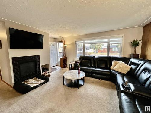 13232 63 St Nw, Edmonton, AB - Indoor Photo Showing Living Room With Fireplace