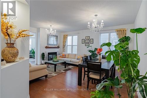 310 Wallaceburg Court, Ottawa, ON - Indoor Photo Showing Living Room With Fireplace