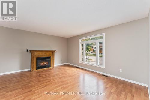 22 Bristow Court, Barrie, ON - Indoor Photo Showing Living Room With Fireplace