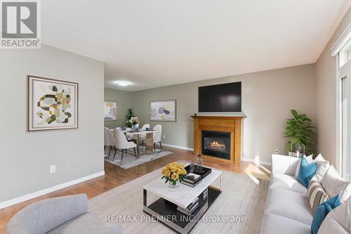 22 Bristow Court, Barrie, ON - Indoor Photo Showing Living Room With Fireplace