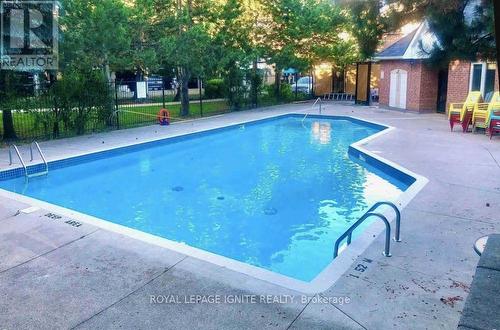 62 - 117 Bristol Road E, Mississauga, ON - Outdoor With In Ground Pool With Backyard