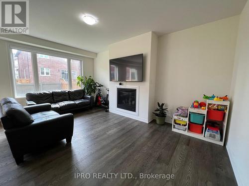 737 Kennedy Circle W, Milton, ON - Indoor Photo Showing Living Room With Fireplace