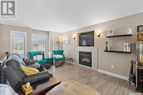 710 Rosewood Boulevard W, Saskatoon, SK - Indoor Photo Showing Living Room With Fireplace