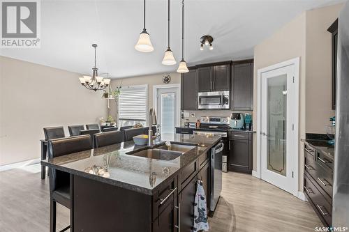 710 Rosewood Boulevard W, Saskatoon, SK - Indoor Photo Showing Kitchen With Double Sink With Upgraded Kitchen