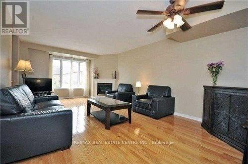 3 - 2370 Britannia Road, Mississauga, ON - Indoor Photo Showing Living Room With Fireplace