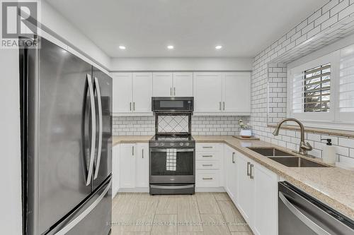 26 - 6060 Snowy Owl Crescent, Mississauga, ON - Indoor Photo Showing Kitchen With Stainless Steel Kitchen With Double Sink With Upgraded Kitchen