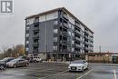 201 - 243 Northfield Drive E, Waterloo, ON  - Outdoor With Balcony With Facade 