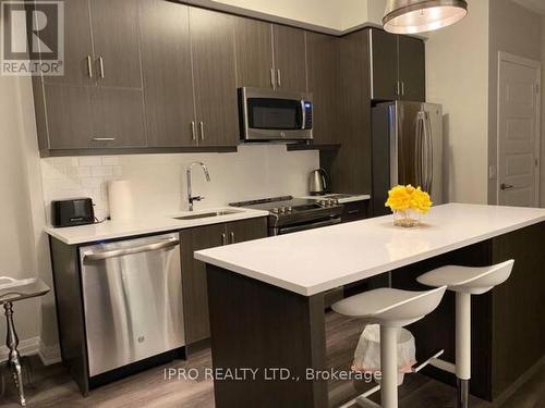 208 - 128 Grovewood Common, Oakville, ON - Indoor Photo Showing Kitchen With Stainless Steel Kitchen