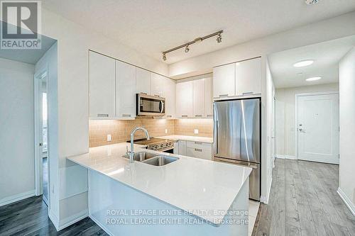 2414 - 35 Watergarden Drive, Mississauga, ON - Indoor Photo Showing Kitchen With Double Sink With Upgraded Kitchen