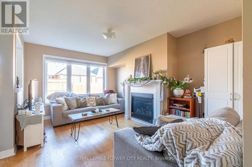 240 Palmer Lane, Woodstock, ON - Indoor Photo Showing Living Room With Fireplace