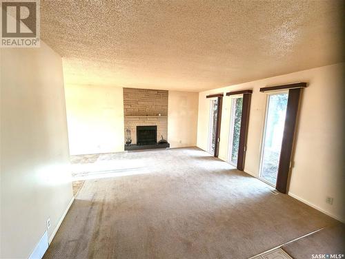 210 3Rd Street S, Martensville, SK - Indoor With Fireplace