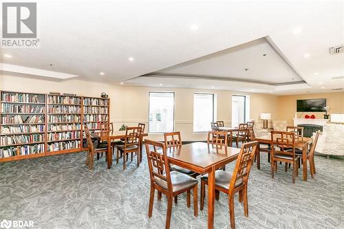 Games/Party Area Featuring A Library - 150 Dunlop Street E Unit# 711, Barrie, ON - Indoor Photo Showing Dining Room